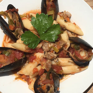 Gluten Free Penne Rigate with Mussels in Tomato and Red wine sauce.